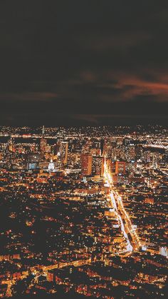 an aerial view of a city at night