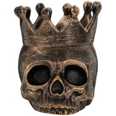 a skull with a crown on it's head is shown in front of a white background