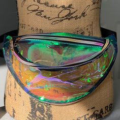 Clear Iridescent Fanny Pack Stadium Bag With Adjustable Waist Strap. See Thru Holographic Effect. Measures Approx. 12”Wx6.5”H This Waist Belt Bag Is Perfect For Travel, Concerts, Festivals, Sporting Events And More. Betsey Johnson Luggage, Louis Vuitton Duffle Bag, Waist Belt Bag, Carryon Bag, Canvas Duffel Bag, Stadium Bag, Bag Transparent, Crossbody Bags For Travel, Tory Burch Sandals