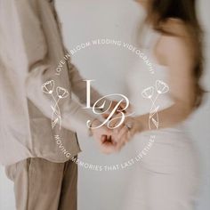 a man and woman standing next to each other in front of a white background with the word love written on it