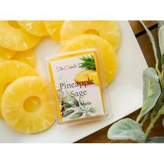 pineapple sage wax in front of sliced pineapples