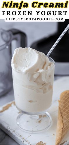 an ice cream sundae with whipped cream in a glass on a white tray and text overlay that reads, nipa creami frozen yogurt