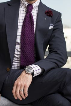 Navy suit, white shirt with with purple windowpane check, purple knit tie A Man In A Suit, Man In A Suit, Mens Fashion Smart, Mens Attire, Prince Albert, Hollywood Fashion, Suit Style