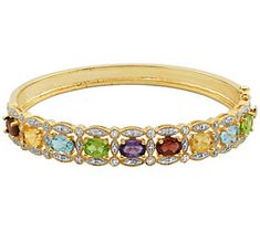 Step out in living color when you accent your wrist with this dazzling bangle bracelet. It's topped with a rainbow of gemstones and radiant diamond accents to help you shine. From Affinity® Gems. Fine Jewelry Multi-stone Bangle, Elegant Gemstone Bangle With Accents, Anniversary Gemstone Accents Bangle Bracelet, In Living Color, Womens Bangles, Silver Bangle Bracelet, Gold C, Gemstone Bangle, Sterling Silver Bangle Bracelets