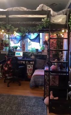 a loft bed in the middle of a room with lots of plants on top of it