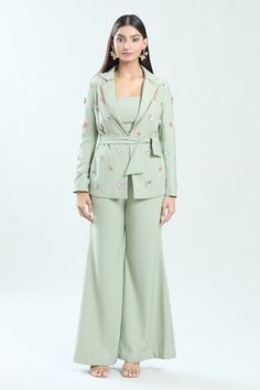 Sage green blazer featuring floral sequin hand embroidery in the front and sleeves. Paired with a flared solid pant a bustier and a belt. - Aza Fashions Sage Green Blazer, Green Blazer, Pant Sets, Embroidered Jacket, Set Women, Full Sleeves, Pant Set, Aza Fashion, Full Sleeve