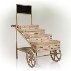 a wooden cart with a chalkboard attached to it