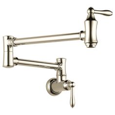 a kitchen faucet with two handles on each side