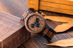 ⭐ High-Quality Wooden Watch with Reasonable Price ⭐ Adjustable Wooden Band ⭐ Professional Engraving Services ⭐ Fast Standard Shipping, Best Anniversary Gift for Husband ✅ High Wooden Craftsmanship, very light, comfortable to wear and durable. We are providing High-Quality Product along with the Reasonable Price. ✅ Accurate Japanese Quartz Movement. Japan Miyota 2035 quartz movement to guarantee an accurate time, original battery that can last more than 3 years. ✅ Perfect Engraving. We'll laser e Stainless Steel Chronograph Watch As Gift, Stainless Steel Chronograph Watch Gift, Stainless Steel Chronograph Watch With Round Dial For Gifts, Gift Chronograph Watch With Subdials, Gift Chronograph Watch With Round Dial And Subdials, Chronograph Watch With Subdials For Gift, Chronograph Watch Accessories With Round Dial, Brown Chronograph Watch With Round Dial As Gift, Round Watches With Date Display As Gift