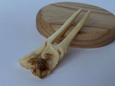 "Hand Carved Bone Hair Stick \"Frog\" Dimensions length-9 cm=3.5\" teeth length-6 cm=2.3\" width-2.4 cm =0.9\" With this exclusive hair stick you will feel yourself irresistible. It is pleasant to touch and well-kept hair. Completely hand carved of cow, ox bone and tonned." Hair Stick Bun, Bun Holder, Hair Fork, Unique Hair, Carved Bone, Hair Stick, Bone Carving, Unique Hairstyles, Paper Straws