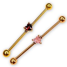 Add a touch of glamour and elegance to your industrial piercing with this stunning 14g heart-shaped barbell. The barbell is crafted from durable stainless steel and features rose gold and gold imitation plating, which gives it a unique and eye-catching appearance. The barbell is adorned with a beautiful multicolor cubic zirconia that sparkles and shines in the light. This industrial barbell is perfect for those who want to make a statement with their piercing and is suitable for everyday wear. The barbell is designed for an industrial piercing and has a gauge of 14g (1.6mm). It is also suitable for those with sensitive skin as it is made from high-quality materials. This beautiful piece of body jewelry is a must-have for any jewelry collection and is perfect for those who want to add some Gold Industrial Piercing, Rose Gold And Gold, Industrial Barbell, Industrial Piercing, Red Sparkle, Pink Red, Body Jewelry, Sensitive Skin, Piercings