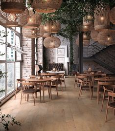 an empty restaurant with lots of wooden tables and chairs in front of large windows that have plants growing on them