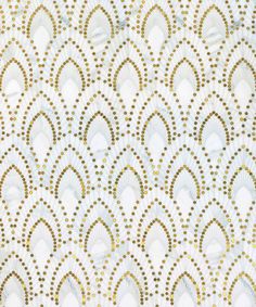 a white and gold wallpaper with lots of dots