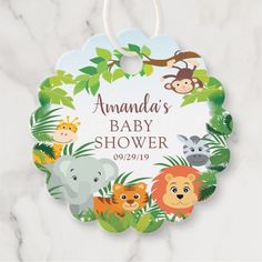 a baby shower ornament with jungle animals