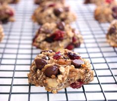 cookies with chocolate chips and nuts on a cooling rack