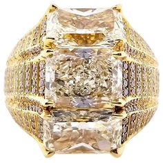 Natural Yellow Radiant Cut Diamond Ring | From a unique collection of vintage Fashion Rings at https://www.1stdibs.com/jewelry/rings/fashion-rings/. Luxury Yellow Gold Diamond Ring With Baguette Cut, Luxury Yellow Gold Diamond Ring Baguette Cut, Luxury Yellow Gold Baguette Cut Diamond Ring, Luxury Yellow Baguette Cut Ring, Luxury Yellow Rings With Single Cut Diamonds, Luxury Yellow Diamond Ring With Pave Setting, Luxury Gold Diamond Ring With Pave Setting, Luxury Gold Diamond Ring With Single Cut Diamonds, Luxury Gold Diamond Ring With Diamond Accents