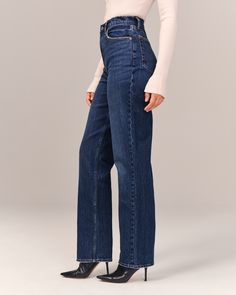 On-trend 90's-style ultra high rise straight jeans in our signature Curve Love fit with built-in stretch for superior comfort featuring our highest rise that sits at your natural waist and looks great with your shirt tucked or untucked. Curve Love features an additional 2" through the hip and thigh to help eliminate waist-gap. With refined details and a vintage feel from top to bottom, this style features a full-length leg, dark wash and clean hem. Straight Silhouette Bottoms For Everyday Spring Wear, Mom Fit Bottoms With Straight Hem For Everyday, Everyday Mom Fit Bottoms With Straight Hem, Chic Mid-rise Mom Fit Bottoms, Casual Straight Silhouette Bottoms For Spring, Straight Silhouette Denim Bottoms For Fall, Denim Bottoms With Straight Silhouette For Fall, Casual Straight Silhouette Jeans For Spring, Chic High Rise Flare Jeans With Straight Fit