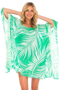 Having a stylish beach cover up is a must! The beautifully printed tunic beach coverup creates a vibrant look. Easy to pull on and easy to pack. Making clothes for the traveling woman. Boho design Lightweight beach dress Semi-Sheer Hand wash in cold water, hang to dry Short Poncho, Traveling Woman, Womens Beach Dresses, Dress Swimwear, Kaftan Top, Beach Coverup Dress, Beach Cover Ups, Making Clothes, Dress Out