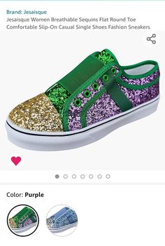 a pair of shoes that are green and purple with gold glitters on the side