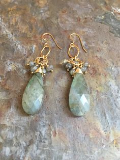 A personal favorite from my Etsy shop https://www.etsy.com/listing/609645093/labradorite-gemstone-gold-statement Faceted Labradorite Dangle Jewelry, Gold Dangle Earrings, Feb 5, Handmade Gold, Etsy Earrings Dangle, Gold Earrings Dangle, Jewelry Designs, Sterling Silver Earrings, Labradorite