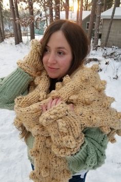 Whimsical oversized bobble scarf knitting pattern. Blanket scarf knitting pattern. This is a fun project made with super bulky yarn. It knits up fast on large-sized needles. Matching fingerless glove pattern is included in one size. Techniques used include knitting, purling, and making bobbles. Fringe can be applied as well. Designed to keep you warm and cozy this winter!

#womensoversizedscarfknittingpattern #indieknits #giftforher #blanketscarfknittingpattern #bobbleknitting #handmade #DIY Knitted Gifts Ideas, Fingerless Glove Pattern, Knitting Patterns For Men, Fingerless Gloves Knitted Pattern, Yarn Scarf, Scarf Knitting Pattern, Chunky Cowls, Glove Pattern, Gloves Pattern