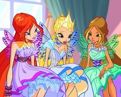 three fairy princesses sitting on a bed together