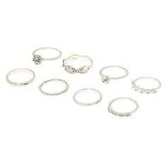 Enhance your style with Claire's 8 Piece Silver Metal Ring Set Small/Medium. This versatile collection offers a range of trendy designs to complement any outfit. Whether you prefer a minimalist look or love stacking multiple rings, this set has got you covered. From delicate bands to eye-catching statement pieces, these rings will add a touch of elegance and individuality to your fingers. Perfect for everyday wear or special occasions, this set is a must-have for fashion-forward individuals. Siz Birthday Presents Ideas, Multiple Rings, Presents Ideas, Shell Choker, Jewelry For Girls, Textured Ring, Fashionable Jewelry, Midi Rings, Jewelry Hair