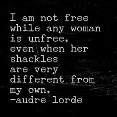 a black and white photo with the words i am not free while any woman is unfree