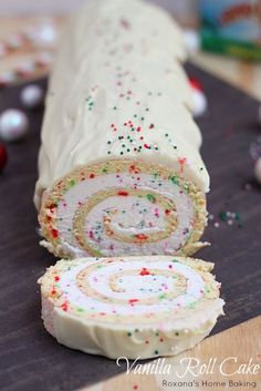 a cake roll with sprinkles cut in half