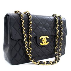 An CHANEL Classic Large 13" Flap Chain Shoulder Bag Black made of black Lambskin j74 This item is Vintage / Classic. The year of manufacture would be 1994-1996.This browser is not supportedConditions & RatingsOutside material: LambskinColor: BlackClosure: Turn LockHardware and chain: Gold-ToneMade in FranceSerial sticker: AttachedSerial #: 3062868 (on the sticker only. No card.)Comes with: NoneOutside: 7 of 10 - Nice condition. Scuff marks on the corners seem to have been repainted. Scratches on the bottom.Inside: 7 of 10 - Nice condition with normal signs of use. Scratches. No stickiness or peeling.Strap and Hardware: 8 of 10 - Shiny and excellent condition with minimal signs of use.See how big the item is by using ARApprox. size: H8.6" x W13.1" x D3.7" (H22 x W33.5 x D9.6 cm)Approx. stra No Card, Shoulder Bag Black, Double Chain, Wearing Clothes, Chain Shoulder Bag, Brunei, Handbag Accessories, Wallet Case, Chanel Bag