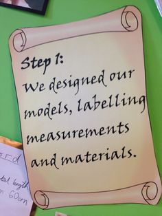 a piece of paper that says, step it we designed our models, labeling measurements and materials