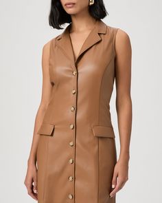 Crafted from our soft stretch faux leather in a warm golden brown shade, this sleeveless mini dress is fitted throughout the waist with princess seams and horn buttons. The Graciella Dress features a blazer-inspired collar and lapel, double flap pockets, and seams at the back. | Graciella Dress - Argan Oil Faux Leather | Size 00 Leather Shirt Dress, Brown Shade, Brown Shades, Princess Seams, Leather Shirt, Princess Seam, Sleeveless Mini Dress, Golden Brown, Argan Oil