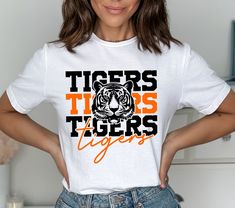 Buy Retro Tigers Shirt, Football Team Shirt, Sport Shirt, Game Day, Match Day is designed & sold by TeeMonkey. SKU 53094589 listed on 08 25, 2023. Most ship worldwide within 24 hours. Delivery to the United States. School Sports Shirts, School Tshirt Designs, Cheer Team Shirts, School Team Shirts, Tigers Svg