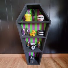 a shelf that has various items on it in the shape of a hexagonal structure