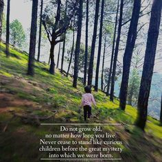 a person walking up a hill in the woods with a quote on it that says do not grow old, no matter how long you live