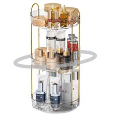 a three tiered round shelf with cosmetics and beauty products on it's sides