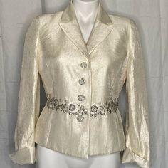 Beautiful Albert Nipon Champagne color  jacket rhinestone buttons to waist. cuffed sleeve embroidered flowers just beautiful 6 Nipon Boutique Coat Size 6 armpit to armpit 18 inches shoulder to hemline 22 inches Luxury Outerwear With Gold Buttons And Suit Collar, Spring Wedding Embellished Blazer, Elegant Long Sleeve Embellished Blazer, Fall Wedding Embellished Outerwear, Vintage Fitted Blazer For Wedding, Elegant Party Blazer With Floral Embroidery, Spring Embellished Fitted Blazer, Tailored Spring Wedding Outerwear, Spring Wedding Fitted Blazer