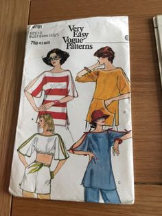 two women's tops and one woman's top sewing pattern on a table