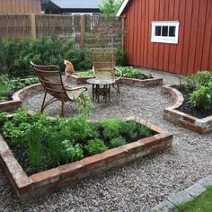 an outdoor garden area with chairs, tables and plants in the center surrounded by gravel