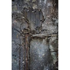 an old door with peeling paint on it