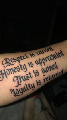 a person with a tattoo on their arm that says respect is family honesty is appreciated trust is owned today is returned