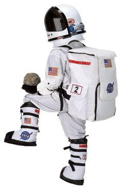 an astronaut is dressed in white and black