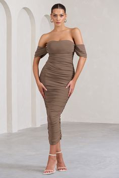 Leave wedding guests lost for words in this aptly-named midi dress. Designed in a breathtaking Bardot silhouette. Lost For Words boasts a bodycon fit made from stretchy ruched jersey. Style this mocha off-shoulder dress with simple accessories like clear slip-on pumps and let your sculpted curves be the overall focus.Features- Premium stretch jersey- Fully ruched- Bodycon fit- Invisible zip closure- Midi lengthSizing & Fit Model is 5'8" and wears UK Size 8 / US Size 4Product InformationDesigned Fitted Midi Dress With Ruched Bodice For Date Night, Fitted Mid-length Bodycon Dress For Date Night, Fitted Midi Length Ruched Dress, Fitted Midi Dress For Date Night, Fitted Mid-length Party Midi Dress, Mid-length Ruched Party Dress, Sheath Midi Dress With Ruched Fitted Bodice, Fitted Midi Dress With Ruched Bodice, Fitted Mid-length Bodycon Dress For Evening