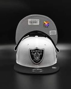 Take it back to the old school look. Get this classic Las Vegas Raiders cap and rep your team! New Era 9Fifty, 950 Features teams logo Light gray color under bill Adjustable snapback closure at the rear 80% acrylic & 20% wool Lv Raiders, Oakley Sunglasses Women, Caps Game, School Look, Logo Light, Light Gray Color, Raider Nation, Take It Back, Lighting Logo