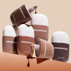 Customise your glow with the Morphe Hot Shot Sun Drops, liquid bronzing drops that instantly warm the complexion with a buildable sun-kissed colour.  Enriched with an Advanced Moisture Complex, algae blend and niacinamide, the formula hydrates and visibly brightens the skin with wear, supporting a long-lasting radiant result. Microfine pearls add multi-luminous dimension, granting a soft bronzed glow that buffs and blends seamlessly across bare skin or over makeup. Bronzing Drops, Jamaican Mango And Lime, Tan Accelerator, Instant Tan, Aromatherapy Associates, Ardell Lashes, Best Tan, Grande Cosmetics, First Aid Beauty