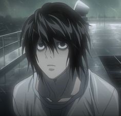 an anime character with black hair standing in the rain