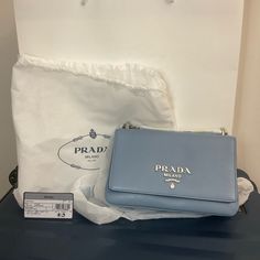 Brand New With Dust Bag, Tag And Shopping Bag. Prada Pattina Mini Bag In Astrale Blue 1bd144 2ebj F0367 Luxury Blue Bags For Everyday, Blue Shoulder Bag For Everyday Luxury, Bag Styling, Blue Prada, Prada Mini, Bags Prada, Bag Prada, Prada Shoulder Bag, Nylon Tote Bags