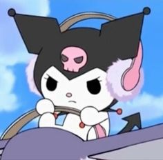 a cartoon character sitting in a car with an animal on it's head and ears