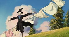 an animated image of a man in a top hat and tails holding clothes on a line