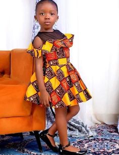 Custom Hand Made African print dresses made with high quality Ankara prints . This Girl's African print Ankara dress is made in beautiful colors suitable for all occasions. Please start an Etsy conversation if interested in making this into family matching outfit or a mom and me matching outfit .  Perfect match for your children birthday party. Be it First  Birthday or 10th birthday milestone this beautiful tutu ball dress, we also make Birthday Tutu dress  Outfit and skirts . Thinking 1st birth Children Gown Styles, Children Ankara Gowns, African Kids Clothes, Ankara Styles For Kids, Kitenge Designs, African Babies, Children Dress, African Dresses For Kids